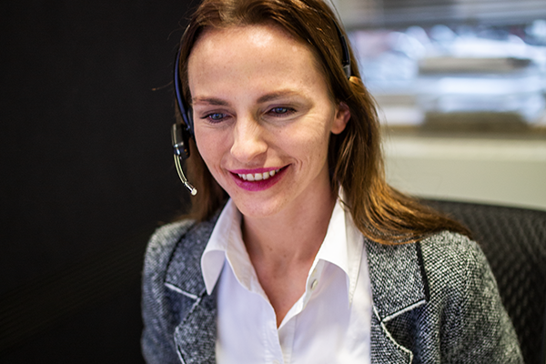 Friendly LAEPPCHÉ employees at work with headset